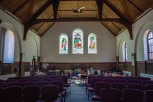 church with stained glass and ceiling